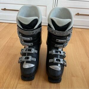 Salomon Black Ski Boots with Silver and Red Accents